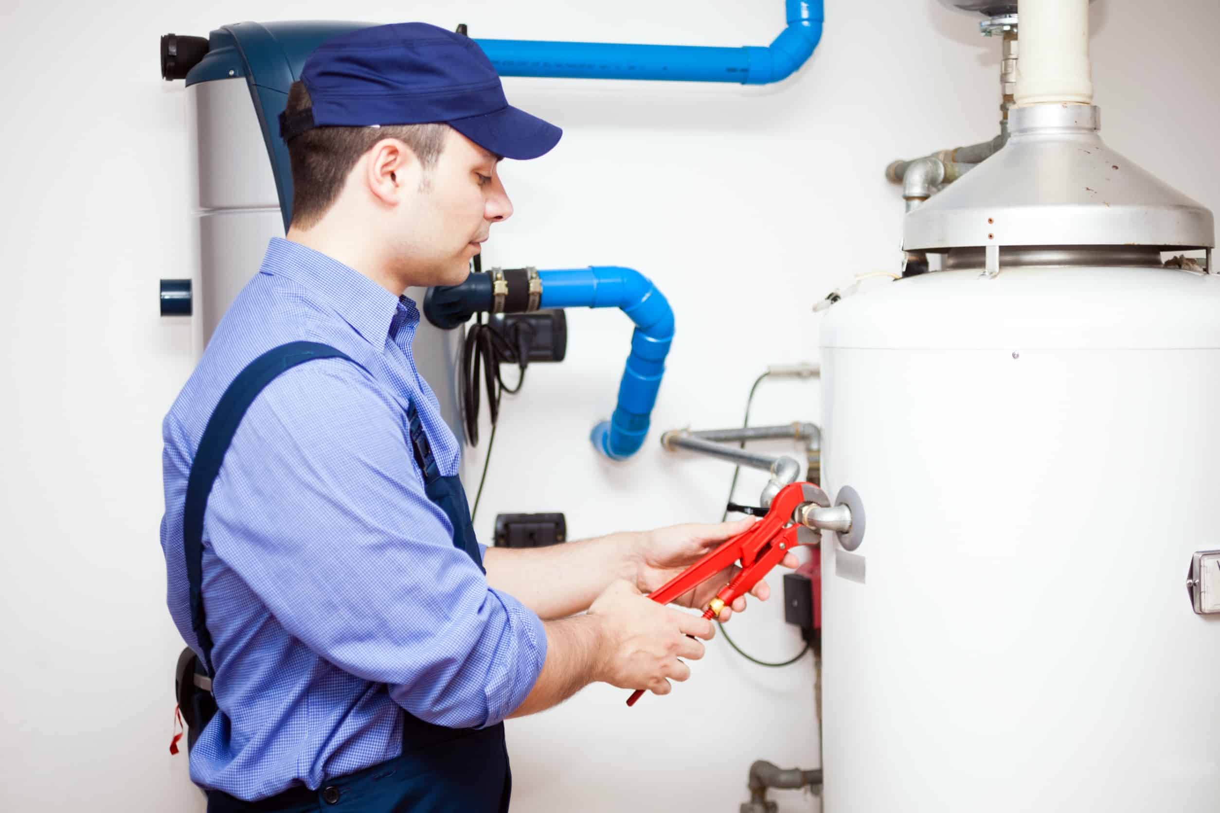 plumber performing water heater installation in simpsonville sc