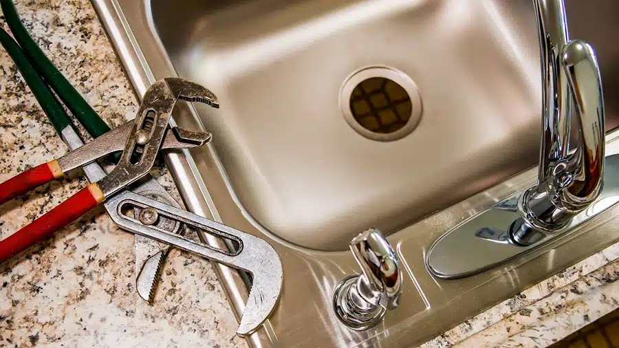 kitchen sink with pipe wrench key